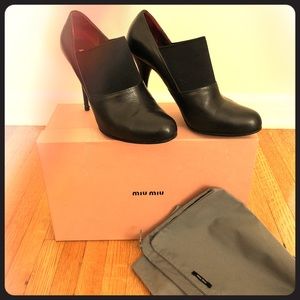 Miu Miu black leather booties